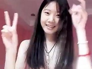 Cute Thai girl shows will not hear of lovable sinistral pussy