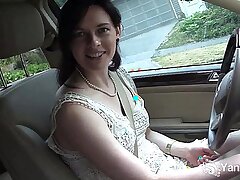 Pretty brunette masturbates in the car during driving